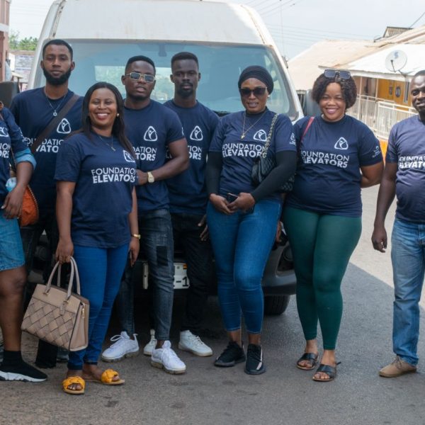 The Foundation Elevators field team assembled in the street before the distribution
