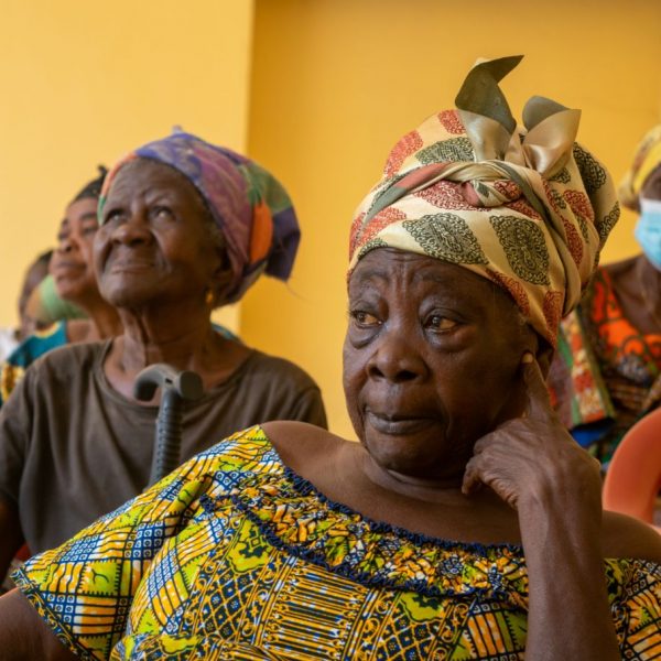Portrait of an elderly widow listening during the gathering